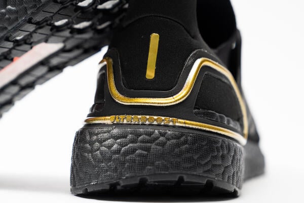 Adidas ultra boost core black gold met online